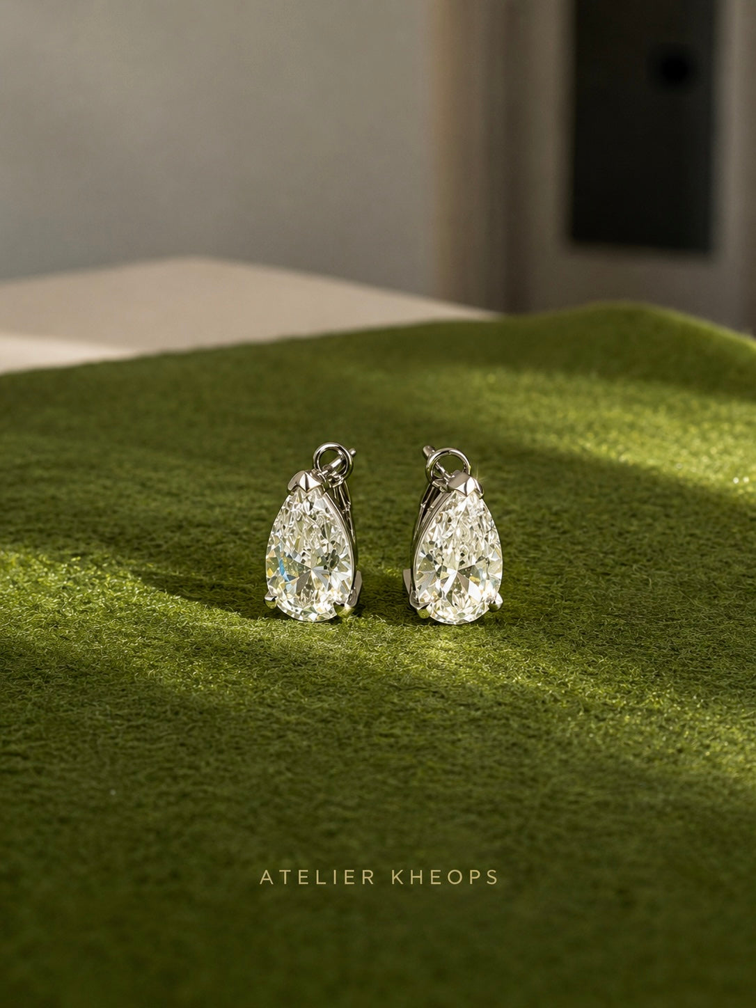 Pear Cut CZ Huggie Earrings