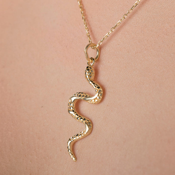 Elegant Gold Serpent Pendant