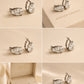 Pear Cut CZ Huggie Earrings