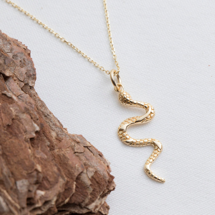 Elegant Gold Serpent Pendant