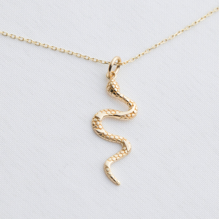 Elegant Gold Serpent Pendant