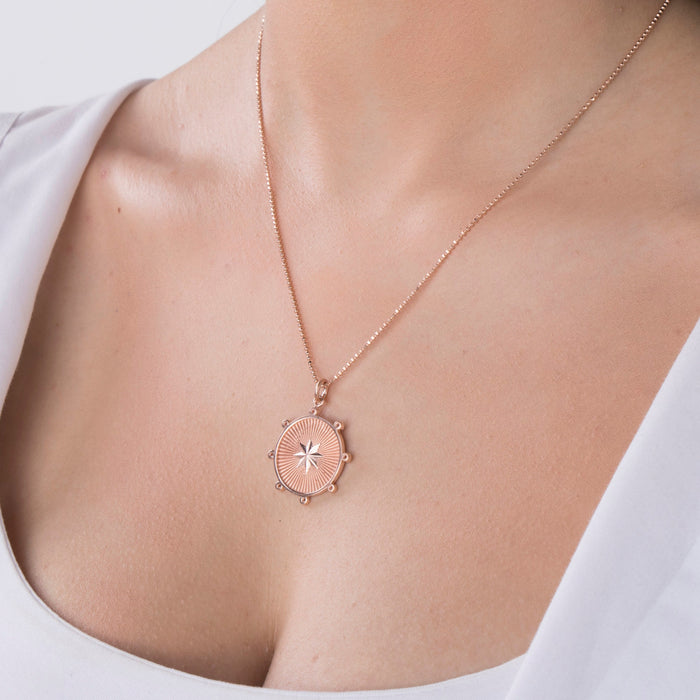 gold starburst necklace