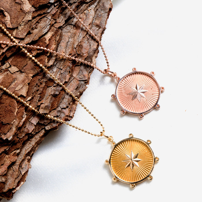 gold starburst necklace