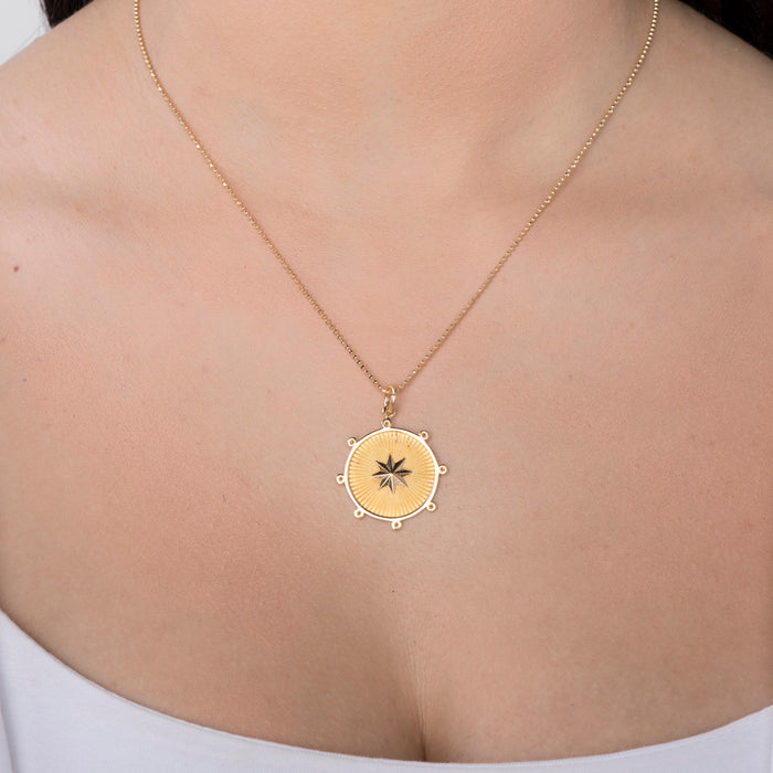 gold starburst necklace