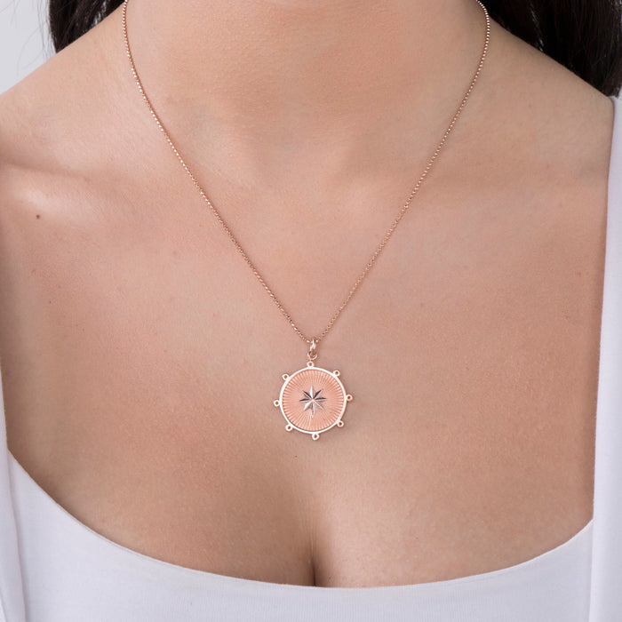 gold starburst necklace