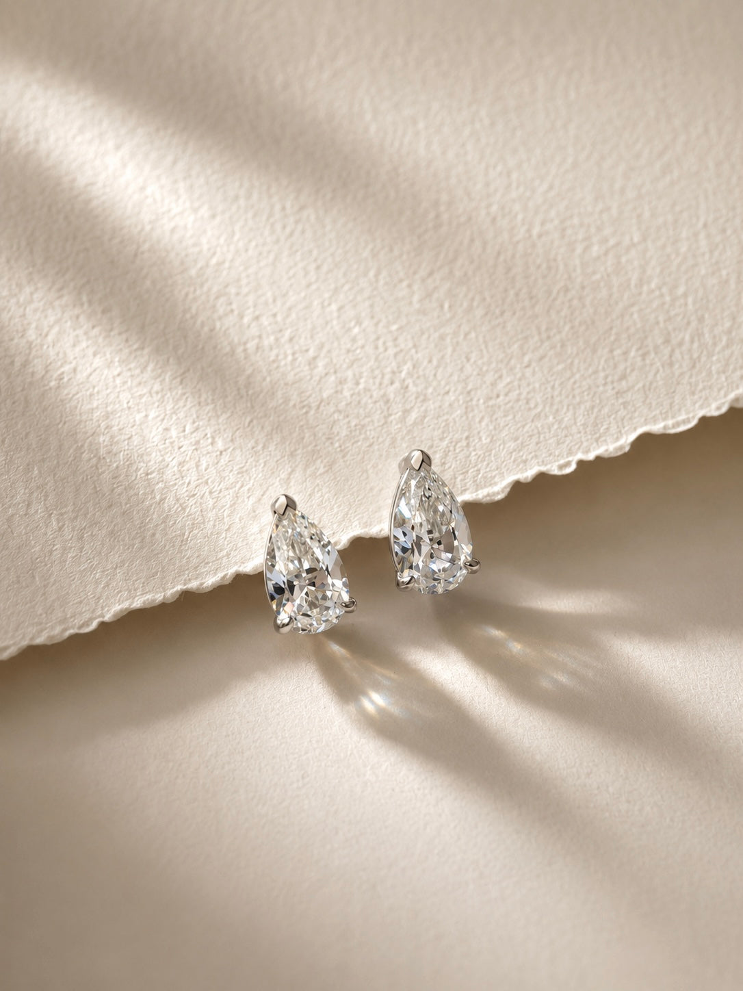 Pear Cut CZ Huggie Earrings