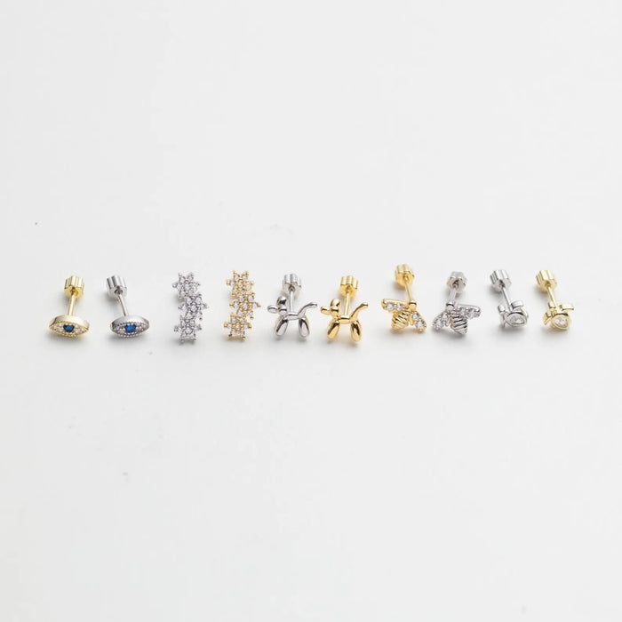 Add a playful yet elegant touch to your ear stack with these Tiny Gold Vermeil Piercing Stud Earrings, available in four unique shapes — Balloon Dog, Turtle, Evil Eye, Star and Bee.
Each piece is crafted in 14K gold vermeil (a thick layer of real 14K gold over 925 sterling silver) for lasting shine and durability, making them perfect for daily wear or mix-and-match layering across multiple piercings.
